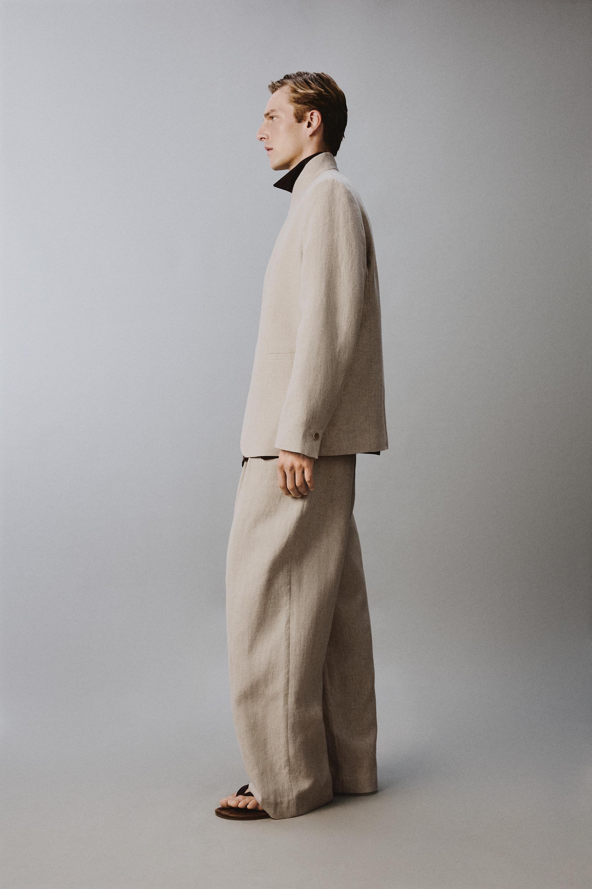 RELAXED FIT PLEATED SUIT PANTS